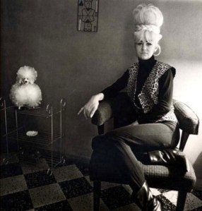 Diane Arbus - Bartender at Home with a Souvenir Dog, New Orleans, 1964.jpg